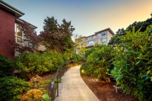 A view looking up a path toward Covenant Living apartments