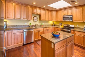 An apartment's kitchen setup with an island